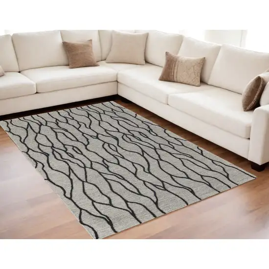 Taupe Black And Gray Wool Abstract Tufted Handmade Stain Resistant Area Rug Photo 1