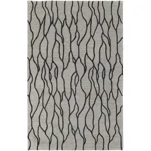 Photo of Taupe Black And Gray Wool Abstract Tufted Handmade Stain Resistant Area Rug