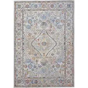 Photo of Taupe Blue And Gray Floral Stain Resistant Area Rug