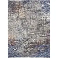 Photo of Taupe Blue And Ivory Abstract Power Loom Distressed Stain Resistant Area Rug