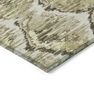 Photo of Taupe Brown And Beige Abstract Washable Indoor Outdoor Area Rug