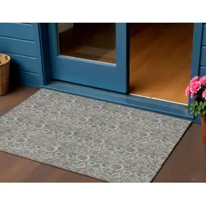 Photo of Taupe Brown And Beige Floral Washable Indoor Outdoor Area Rug