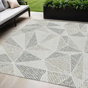 Photo of Taupe Brown And Beige Geometric Washable Indoor Outdoor Area Rug