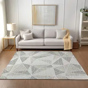 Photo of Taupe Brown And Beige Geometric Washable Indoor Outdoor Area Rug