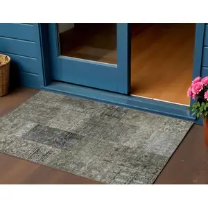 Photo of Taupe Brown And Charcoal Patchwork Washable Indoor Outdoor Area Rug