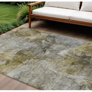 Photo of Taupe Brown And Gray Abstract Washable Indoor Outdoor Area Rug