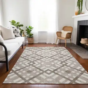 Photo of Taupe Brown And Ivory Geometric Washable Indoor Outdoor Area Rug