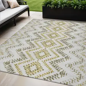 Photo of Taupe Brown And Ivory Geometric Washable Indoor Outdoor Area Rug