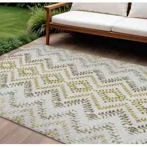 Photo of Taupe Brown And Ivory Geometric Washable Indoor Outdoor Area Rug