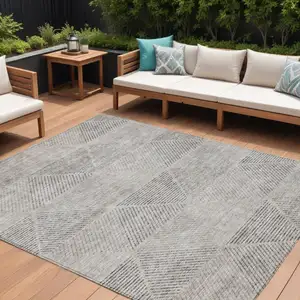 Photo of Taupe Brown And Ivory Geometric Washable Indoor Outdoor Area Rug