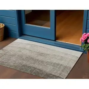 Photo of Taupe Brown And Ivory Ombre Washable Indoor Outdoor Area Rug