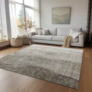 Photo of Taupe Brown And Ivory Ombre Washable Indoor Outdoor Area Rug