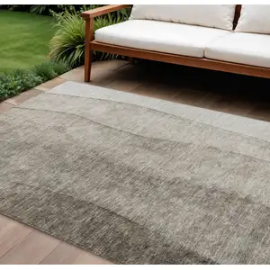 Photo of Taupe Brown And Ivory Ombre Washable Indoor Outdoor Area Rug