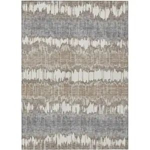 Photo of Taupe Brown And Ivory Striped Washable Indoor Outdoor Area Rug