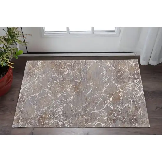 Taupe Brown and Ivory Abstract Power Loom Area Rug Photo 1