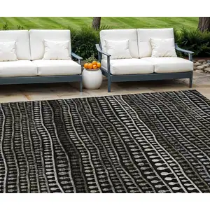 Photo of Taupe Charcoal And Gray Striped Washable Indoor Outdoor Area Rug