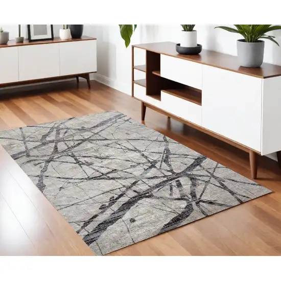 Taupe Gray And Ivory Abstract Stain Resistant Area Rug Photo 1