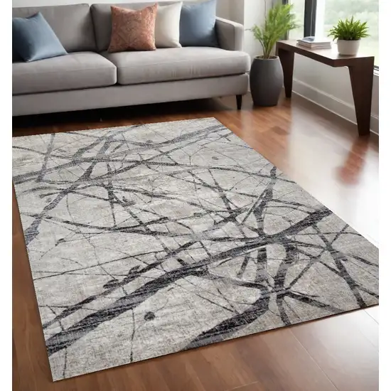 Taupe Gray And Ivory Abstract Stain Resistant Area Rug Photo 1