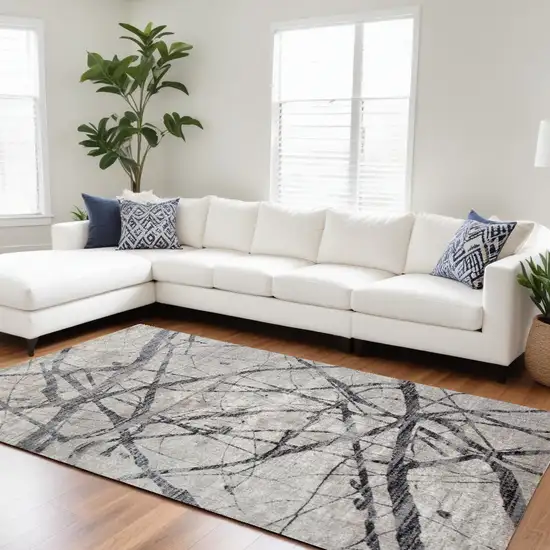 Taupe Gray And Ivory Abstract Stain Resistant Area Rug Photo 1