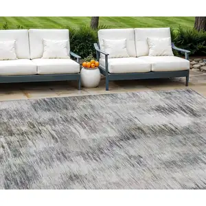 Photo of Taupe Gray And Silver Abstract Washable Indoor Outdoor Area Rug