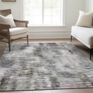 Photo of Taupe Gray And Silver Abstract Washable Indoor Outdoor Area Rug