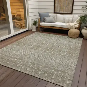 Photo of Taupe Green And Ivory Tribal Washable Indoor Outdoor Area Rug