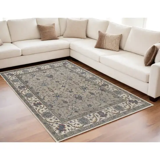 Ivory and Blue Wool Floral Hand Tufted Area Rug Photo 1