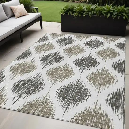 Taupe Ivory And Brown Ikat Washable Indoor Outdoor Area Rug Photo 1