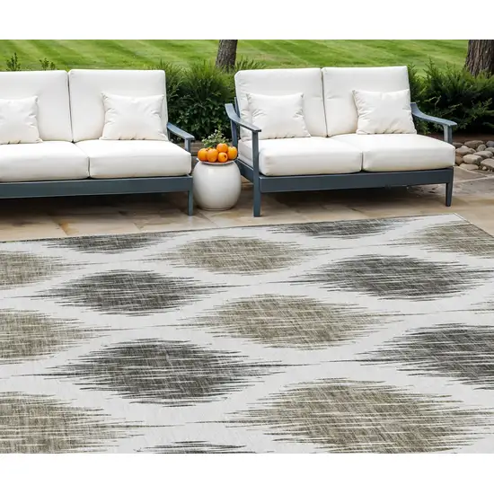 Taupe Ivory And Brown Ikat Washable Indoor Outdoor Area Rug Photo 1