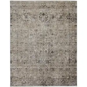 Photo of Taupe Ivory And Gray Abstract Distressed Area Rug With Fringe