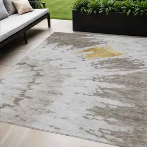 Photo of Taupe Khaki And Ivory Abstract Washable Indoor Outdoor Area Rug