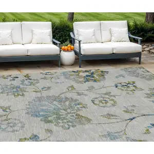 Photo of Taupe Navy Blue And Denim Blue Floral Washable Indoor Outdoor Area Rug