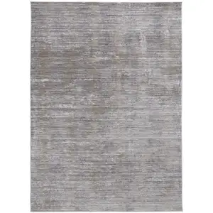 Photo of Taupe Silver And Tan Abstract Power Loom Area Rug