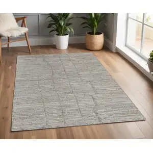 Photo of Taupe and Gray Abstract Hand Woven Worn Faded Area Rug