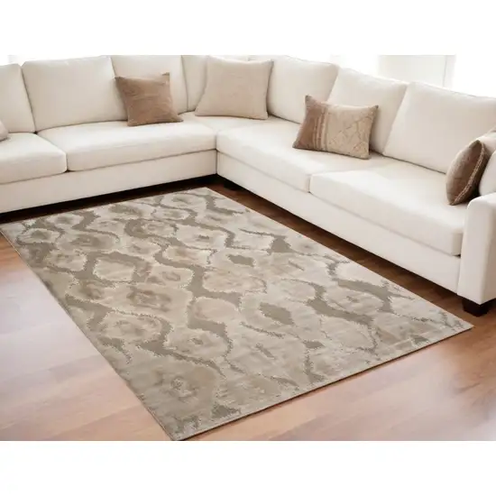 Taupe and Ivory Abstract Power Loom Worn Faded Area Rug Photo 1