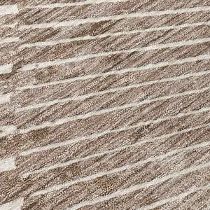 Photo of Taupe and Ivory Abstract Washable Non Skid Indoor Outdoor Area Rug