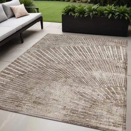 Taupe and Ivory Abstract Washable Non Skid Indoor Outdoor Area Rug Photo 1