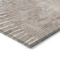 Photo of Taupe and Ivory Abstract Washable Non Skid Indoor Outdoor Area Rug