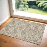 Photo of Taupe and Ivory Floral Area Rug