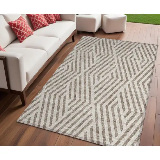 Taupe and Ivory Geometric Washable Non Skid Indoor Outdoor Area Rug Photo 1