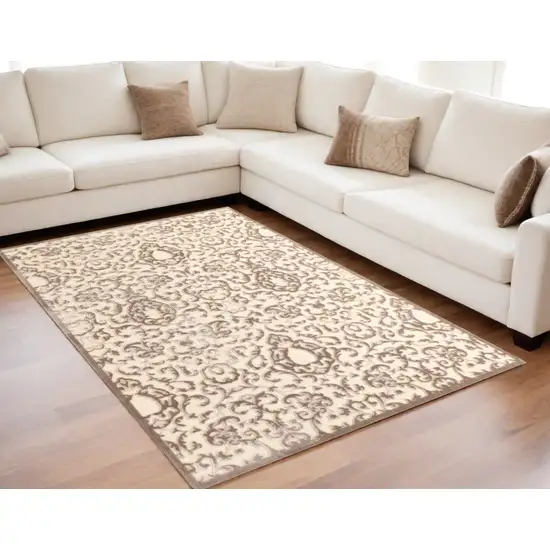 Taupe and Tan Floral Power Loom Area Rug Photo 1