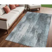 Photo of Teal Abstract Washable Non Skid Indoor Outdoor Area Rug