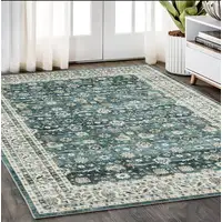 Photo of Teal And Ivory Oriental Distressed Area Rug