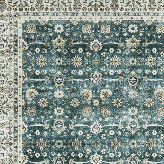 Teal And Ivory Oriental Distressed Area Rug Photo 7