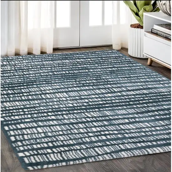 Teal And Ivory Striped Distressed Area Rug Photo 1