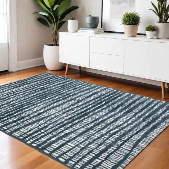 Teal And Ivory Striped Distressed Area Rug Photo 1