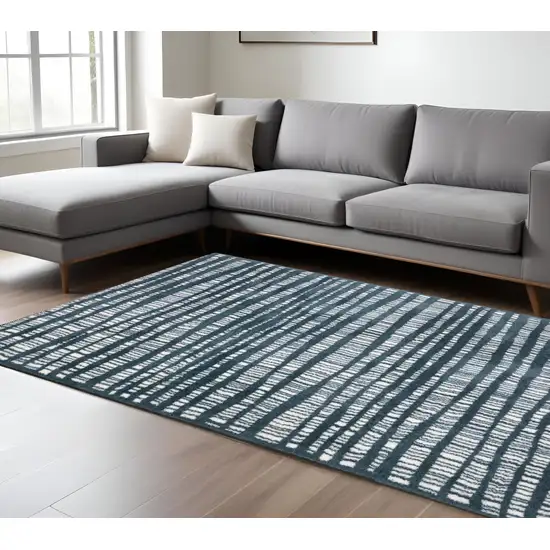 Teal And Ivory Striped Distressed Area Rug Photo 1