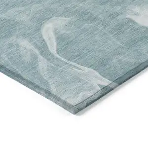 Photo of Teal Blue And Aqua Abstract Washable Indoor Outdoor Area Rug