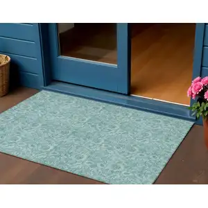 Photo of Teal Blue And Aqua Floral Washable Indoor Outdoor Area Rug