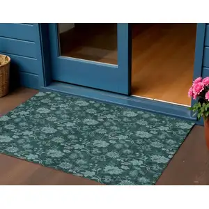 Photo of Teal Blue And Aqua Floral Washable Indoor Outdoor Area Rug